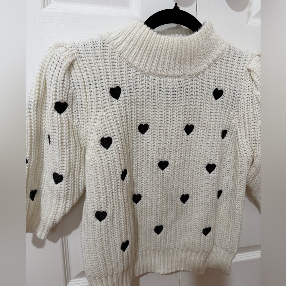 Anthropologie Cream Sweater with Black Heart Accents